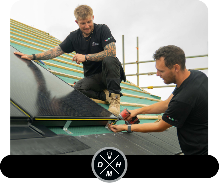 Dan and Jay installing solar panels to new build property in Darlington